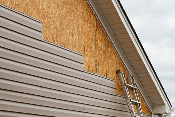 Professional Fiber Cement Siding technician working in Chincoteague Island, VA